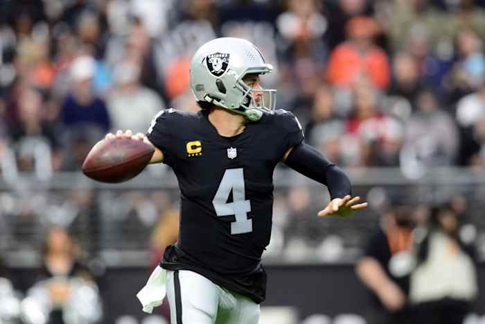 Dec 26, 2021; Paradise, Nevada, USA; Las Vegas Raiders quarterback Derek Carr (4) throws a pass against the Denver Broncos during the first half at Allegiant Stadium. Mandatory Credit: Joe Camporeale-USA TODAY Sports